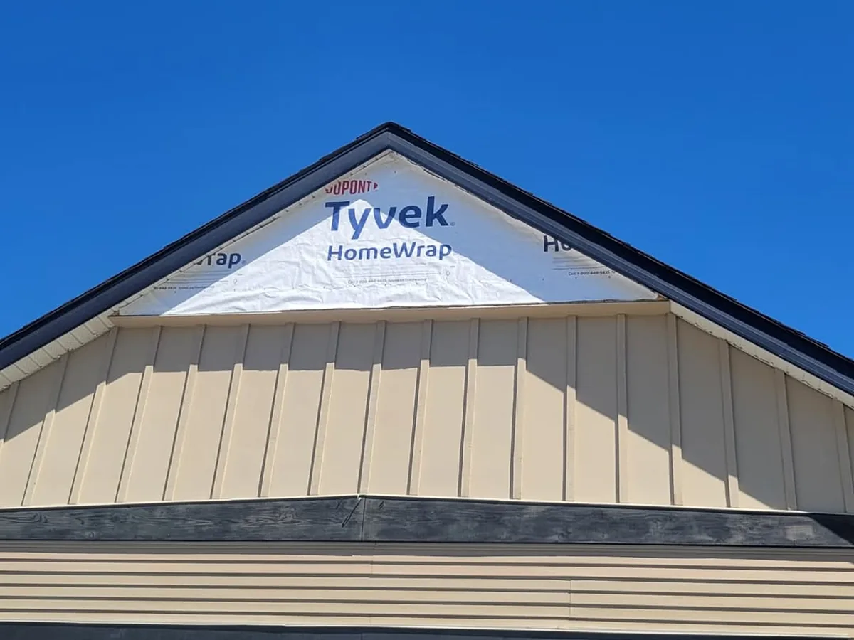 Completed siding with black trim by Hunter Exteriors