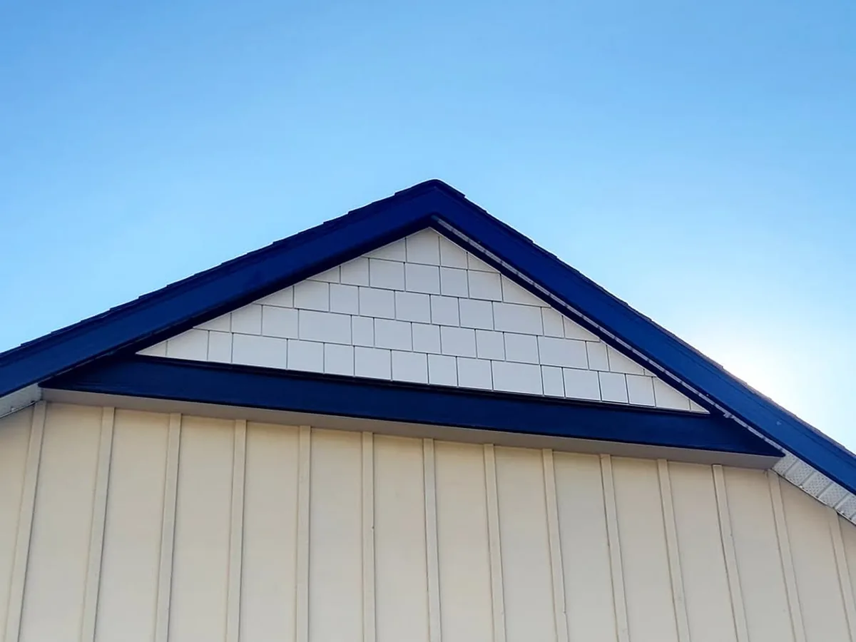 Mixed shake and board-and-batten gable detail by Hunter Exteriors